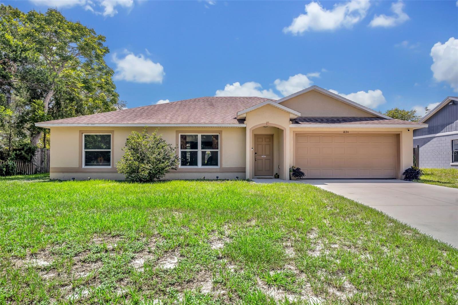 Come see this well-maintained 3-bedroom, 2-bathroom home, built in 2017 and thoughtfully cared for by its original owner. Sitting on a .23-acre lot with a fully fenced backyard, this property offers the ideal blend of comfort, privacy, and functionality in a convenient Deltona location.
Step inside to an open-concept floor plan that connects the living, dining, and kitchen areas—perfect for both entertaining and everyday living. You’ll love the beautiful tile flooring throughout the main living spaces, while all bedrooms feature soft, plush carpeting for added comfort.
A covered patio overlooks the private backyard, offering a peaceful space to relax or host gatherings. The split-bedroom layout ensures added privacy, and the home’s overall condition reflects true pride of ownership.
Just minutes from I-4, as well as local shopping, dining, and everyday conveniences, this home offers easy access to everything Central FL has to offer.
Whether you're relocating, growing, simplifying, or investing—this move-in-ready property fits a variety of lifestyles and needs.