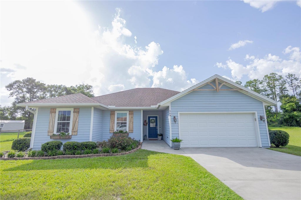 Photo of 568 SW Gerald Conner Drive, Lake City, FL 32024 (MLS # OM728379)