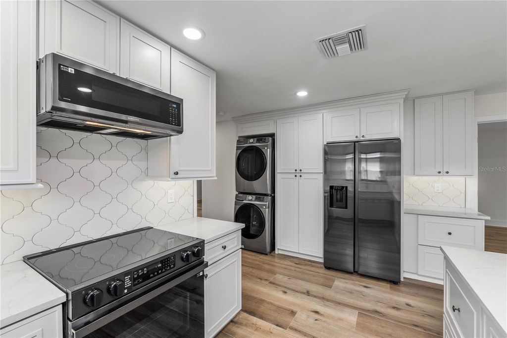 Photo of 3819 Shore Acres Boulevard NE, St Petersburg, FL 33703 (MLS # A4665611)