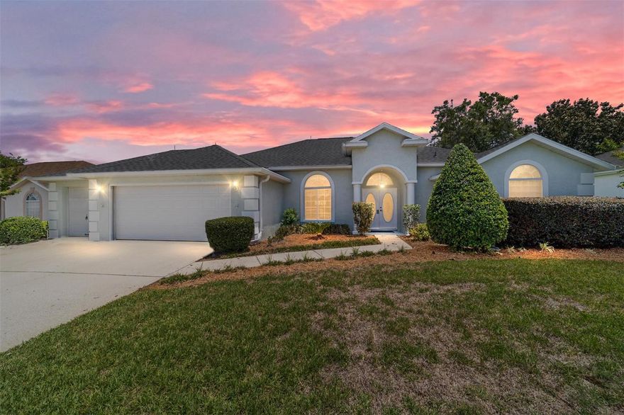 RESORT-STYLE LIVING WITH STUNNING GOLF COURSE VIEWS IN OCALA PALMS! Enjoy living in this well-established active adult community that offers Country Club living just minutes from the World Equestrian Center (WEC) and a short drive to Downtown Ocala. This custom-built Sago floor plan has been lovingly maintained by its original owner and offers a combination of quality craftsmanship, spacious living, and incredible golf course views. Positioned overlooking the 7th tee, this home delivers both privacy and a relaxing setting to enjoy Florida living at its finest. Inside, the thoughtfully designed split-bedroom floor plan creates comfortable everyday living with generous room sizes and abundant storage throughout. The spacious primary suite features vaulted ceilings, two walk-in closets, and an ensuite bathroom complete with dual sinks, a garden tub, and separate shower.  The primary bedroom opens up to the Florida Room, where you can sit and enjoy a sunrise! Guests will appreciate the privacy of their own wing, where both bedrooms offer excellent closet space and share a guest bath with double sinks and a tub/shower combination. Designed for both entertaining and comfortable living, the home offers a formal living room enhanced with stunning custom built-ins that add elegance and functionality, along with a formal dining room large enough to accommodate a full dining set for gatherings with family and friends. The open kitchen flows easily into the living areas and nearby den/flex room—perfect for a home office, hobby room, reading area, or additional TV space. The indoor utility room adds everyday convenience and additional storage potential. One of the standout features of this home is the spacious tiled and enclosed Florida Room overlooking the golf course. Complete with custom cabinetry and a mini refrigerator, this space is ideal for entertaining guests, hosting game nights, or simply relaxing while enjoying peaceful golf course views. Additional highlights include owned and fully paid-off solar panels for energy efficiency and long-term savings, a roof replacement in 2018 for added peace of mind, and an oversized and extended 2-car garage with a separate golf cart garage and additional storage space—perfect for hobbies, tools, or workshop needs. Located within walking distance to the clubhouse, recreation center, and community amenities, residents of Ocala Palms enjoy an active lifestyle with access to a 19,000 square-foot clubhouse featuring an indoor pool, outdoor pool and spa, fitness center, arts and crafts studios, sewing room, billiards hall, card room, library, table tennis, multipurpose gathering spaces, and the Magnolia Ballroom for events and social activities. Outdoor enthusiasts can enjoy tennis, bocce ball, shuffleboard, horseshoes, volleyball, croquet, and optional membership opportunities at the 18-hole golf course. Blanca’s Cafe offers a convenient neighborhood spot to meet friends for lunch or dinner, while RV parking is also available for visiting guests.  This is your opportunity to enjoy the best of resort-style active adult living in one of Ocala’s most welcoming and conveniently located communities.