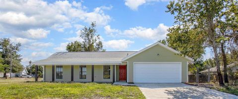 Photo of 1809 E Chapel Drive, Deltona, FL 32725 (MLS # V4945719)
