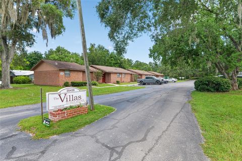 Photo of 20420 NW 243rd Drive, High Springs, FL 32643 (MLS # GC541957)