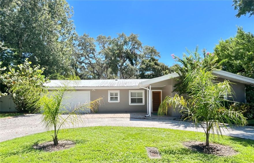 SOUGHT AFTER SAFETY HARBOR LOCATION, WITH FABULOUS VIEWS OF TAMPA BAY!!! The moment you enter this SPACIOUS 3 bedroom, 3 FULL BATH home, you will love the tranquility of the sparkling water views and lush tropical landscaping! The SPLIT FLOOR PLAN offers plenty of privacy. Gorgeous TERRAZZO FLOORING throughout. FRESHLY PAINTED INSIDE AND OUT! LARGE EAT IN KITCHEN with NEWER Stainless Steel Appliances and NEWER Stainless Sink/Faucet. NEW Energy Efficient A/C System, attached 2 Car Garage with Washer/Dryer and Laundry Sink. A Lovely OVERSIZED screened in Lanai overlooks Tampa Bay and has A HUGE FENCED IN YARD, along with a PAVER DECK PERFECT FOR GRILLING OUT. This neighborhood is only 1/2 block from Tampa Bay. Beautiful new homes around you! Walk to spectacular Philippe Park, Marina Park, and Downtown Safety Harbor A lovely, quiet location, minutes to Great shopping, Restaurants, Gulf Beaches, Airports, and surrounding cities. This home and view is a beautiful surprise inside, that is missed just viewing from driving by! Enjoy the wonderful Life Style that Safety Harbor offers in this charming seaside community.