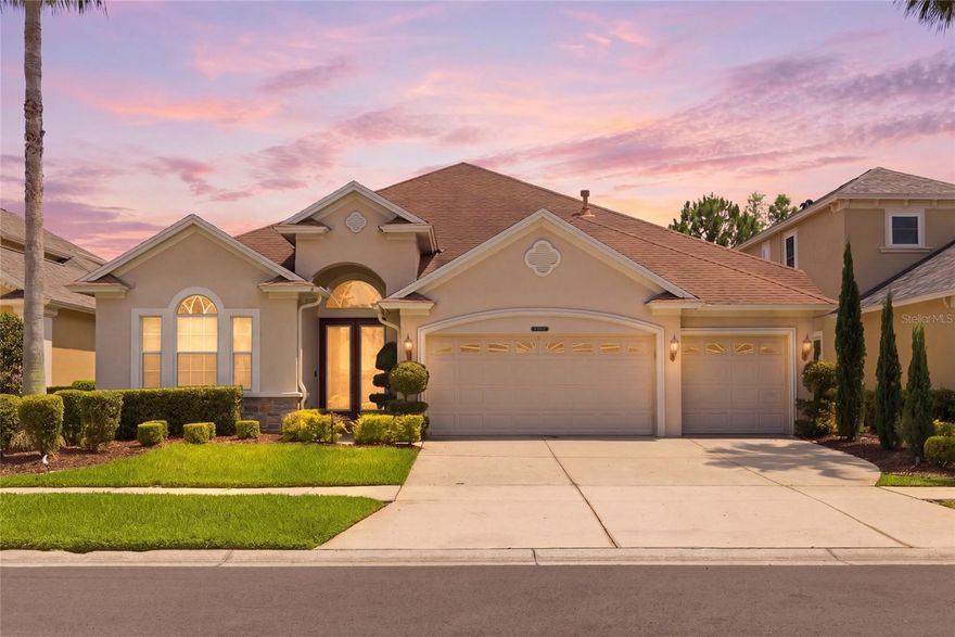 Welcome to 8309 Old Town Drive, a beautifully maintained and updated pool home tucked inside the highly sought-after guard-gated community of Grand Hampton in Tampa. This spacious 4-bedroom, 4-bath residence with a 3-car garage blends warmth, elegance, and modern upgrades across more than 3,200 square feet of thoughtfully designed living space.
From the moment you enter through the double glass front doors, you are greeted with soaring ceilings, abundant natural light, and an open-concept layout that feels both grand and inviting. The main living area showcases oversized sliding glass doors overlooking the screened pool, creating the perfect indoor-outdoor Florida lifestyle.
The fully renovated kitchen opens seamlessly to the living and dining spaces and features updated cabinetry, modern countertops, stylish backsplash, upgraded finishes, stainless steel appliances, and an oversized breakfast bar ideal for entertaining. Neutral tones, crown molding, and designer-inspired touches throughout the home create a clean, upscale aesthetic that feels both luxurious and move-in ready.
The primary suite serves as a true retreat with rich hardwood flooring, tray ceilings, oversized windows, and a completely remodeled spa-style bathroom featuring dual vanities, freestanding soaking tub, expansive walk-in shower, and luxury finishes throughout. 
Upstairs, the home offers an expansive media room perfect for family movie nights, sporting events, or entertaining guests, along with a large playroom/flex space that provides endless possibilities for a game room, home office, fitness area, or additional lounge space. The second floor also features a full bathroom and a private covered balcony overlooking the pool , creating the perfect place to unwind and enjoy Florida living.
Located in one of New Tampa’s premier communities, Grand Hampton offers residents access to a clubhouse, resort-style pool, fitness center, tennis courts, walking trails, and convenient access to I-75, shopping, dining, USF, Moffitt Cancer Center, and top-rated medical facilities.
8309 Old Town Drive offers the perfect balance of luxury, comfort, and modern functionality in one of Tampa’s most desirable communities.