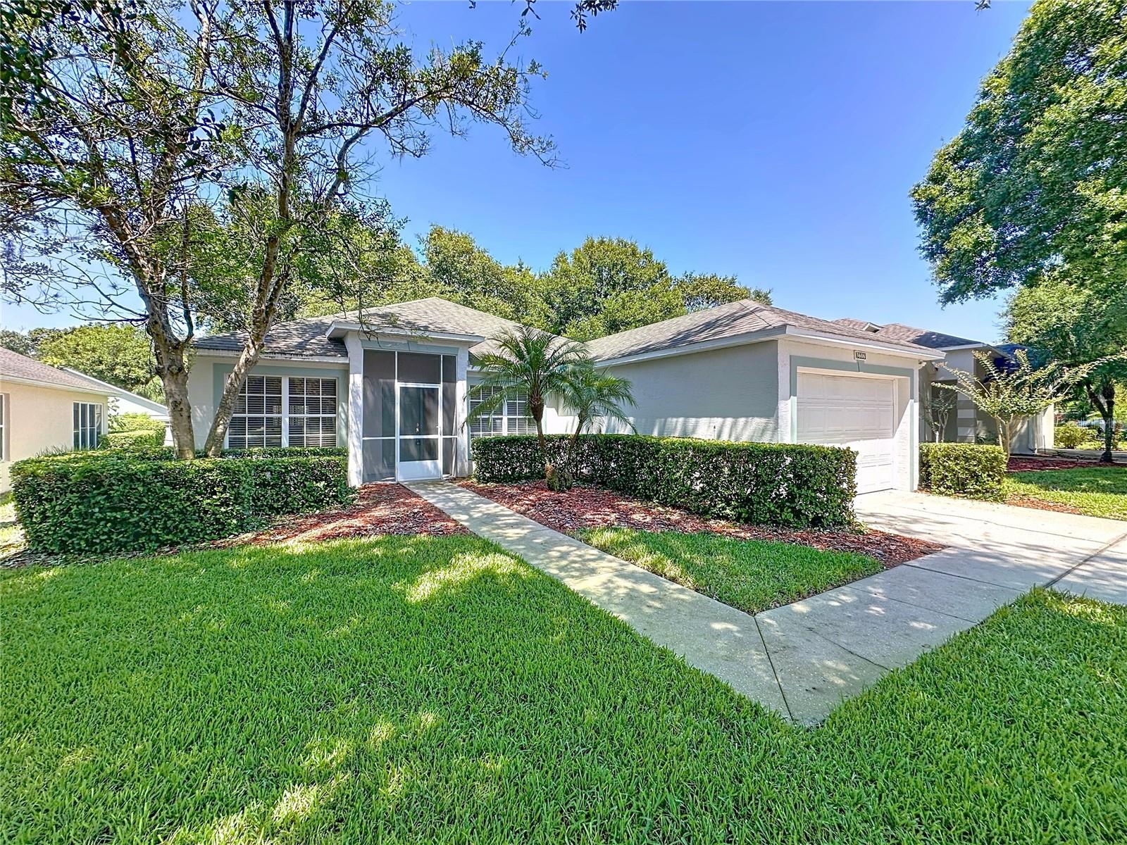This Crown model is priced to sell. Home is being sold furnished. The kitchen has been remodeled with wood cabinetry, granite counter tops and stainless sink. Roof changeout in June 2015 , HVAC changeout in 2013 and a new water heater. . There is tile flooring throughout the home. No carpets. The den is currently being used as the dining room. The dining room is currently being used as part of the family room. Both bathrooms have comfort height toilets & newer counter tops. Separate laundry room & Maytag washer & dryer remain. A back Screen enclosure was added and the lanai area opened. Kings Ridge is a 55 Plus gated golf community located in the rolling hills of Clermont, FL. Enjoy the Royal life style in the multi-million $ clubhouse with 3 heated pools, spas, tennis & pickle ball courts, billiards, shuffle board, shows, Bingo, cards and clubs galore. The monthly maintenance fees include: lawn maintenance including trimming of shrubs, care of irrigation system & irrigation water, internet, TV & home phone thru Fibernow/Opticaltel, maintenance of roads and outside painting of home every 7 years. Take your golf cart to the Kings Ridge Plaza where you can do your grocery shopping, banking or dining out.