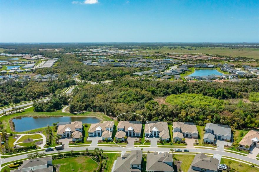 Welcome to 8458 Snowfall Street, an exceptional residence completed in 2024 and located in the highly sought-after Skye Ranch community of Sarasota, where luxury living meets a vibrant, family-oriented neighborhood and outstanding resort-style amenities. This impressive home offers 4 bedrooms, 4 full bathrooms, and 2 half baths across a spacious, thoughtfully designed floor plan that balances comfort, style, and functionality. The residence includes the primary bedroom on the first floor, a private office and a dedicated media room and in-law-suite on the second floor providing flexible spaces for work, entertainment, and everyday living. Expansive open living areas are filled with natural light and designed for effortless entertaining, seamlessly connecting the interior living spaces with the outdoor retreat. 
Outdoor living is truly resort-inspired. The expansive 1400 square ft. lanai features an oversized pool and spa, along with a fully equipped outdoor kitchen, fire pit and golf putting green creating the perfect setting for hosting gatherings or enjoying relaxing evenings in your private backyard oasis. Beyond the home itself, residents of Skye Ranch enjoy one of Sarasota's most dynamic master-planned communities. At the heart of the neighborhood is The HUB Amenity Center, where families gather to enjoy a resort-style pool and splash pad, fitness center, basketball court, climbing wall, clubhouse and café, sports courts, playgrounds, dog park, and scenic walking and biking trails woven throughout beautiful natural preserves. The HUB also hosts a lively calendar of community events, family activities, movie nights, and seasonal celebrations, creating a warm and welcoming environment where neighbors quickly become friends. Ideally located near the new Skye Ranch K-8 School and just minutes from I-75, shopping, dining, and Sarasota's world-renowned Gulf Coast beaches, this remarkable home offers the perfect balance of luxury, recreation, and community connection.