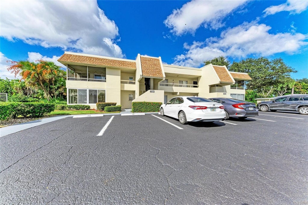 Photo of 7304 W Country Club Drive N #115, Sarasota, FL 34243 (MLS # A4711081)