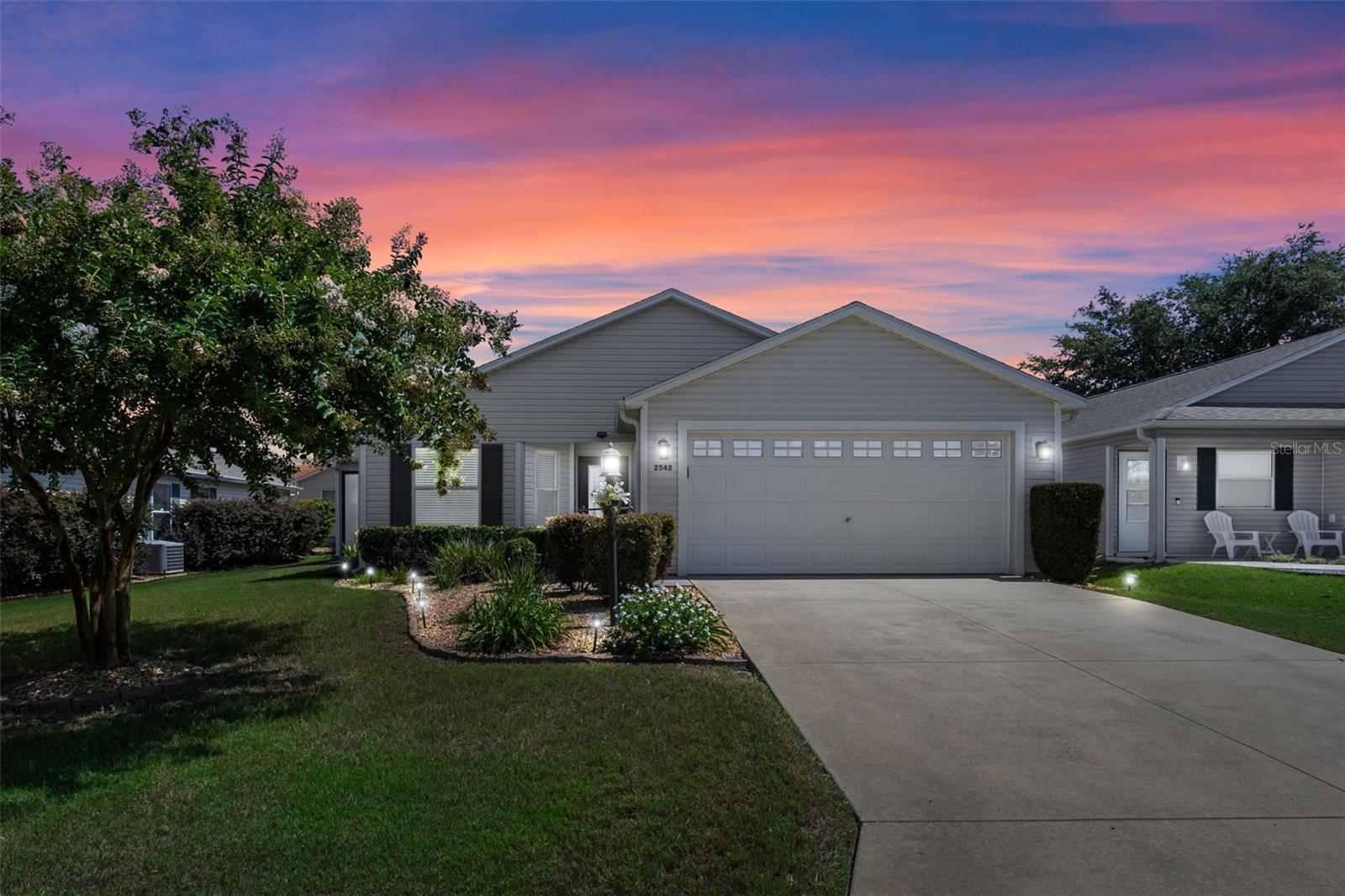 **NEW ROOF** Welcome to 2542 Eldon Place—a beautifully maintained 3-bedroom, 2-bathroom home ideally situated in the heart of The Villages. With a thoughtfully designed layout and inviting updates throughout, this residence offers comfort, functionality, and Florida charm in the Village of Buttonwood.
Step inside to find an open-concept living and dining area with vaulted ceilings, abundant natural light, and warm wood-look flooring. The spacious kitchen features stainless steel appliances, solid wood cabinetry, a pantry, and a cozy breakfast nook—perfect for casual mornings.
The split bedroom floor plan provides privacy and flexibility. The primary suite is a relaxing retreat complete with an oversized walk-in, and an en-suite bath with dual vanities and a walk-in shower. Two guest bedrooms, one of which is ideal for a home office or hobby space, are tucked away near a secondary full bath.
Enjoy year-round relaxation in the enclosed Florida room, surrounded by large windows that let in plenty of light while offering peaceful backyard views. Just beyond is a spacious patio, ideal for entertaining, grilling, or soaking up the sunshine in your private outdoor space.
Located between Market Square at Lake Sumter Landing and Paddock Square at Brownwood- options for shopping, dining and entertainment are bountiful- all while the Executive Golf Courses at Redfish Run, Bonita Pass and Tarpon Boil just minutes away.
This home offers the an easy blend of low-maintenance living and community amenities, a perfect place to start your life in The Villages! Schedule your private tour today!