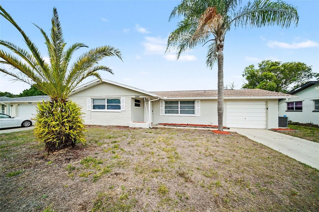Photo of 7541 Spirea Drive, Port Richey, FL 34668 (MLS # O6398873)
