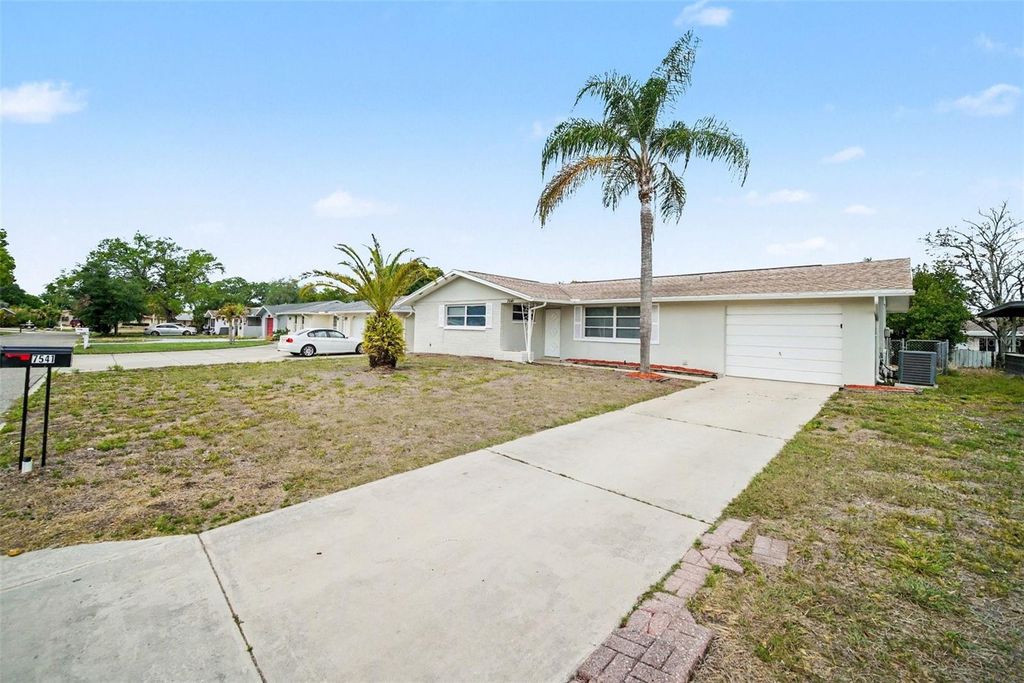 Photo of 7541 Spirea Drive, Port Richey, FL 34668 (MLS # O6398873)