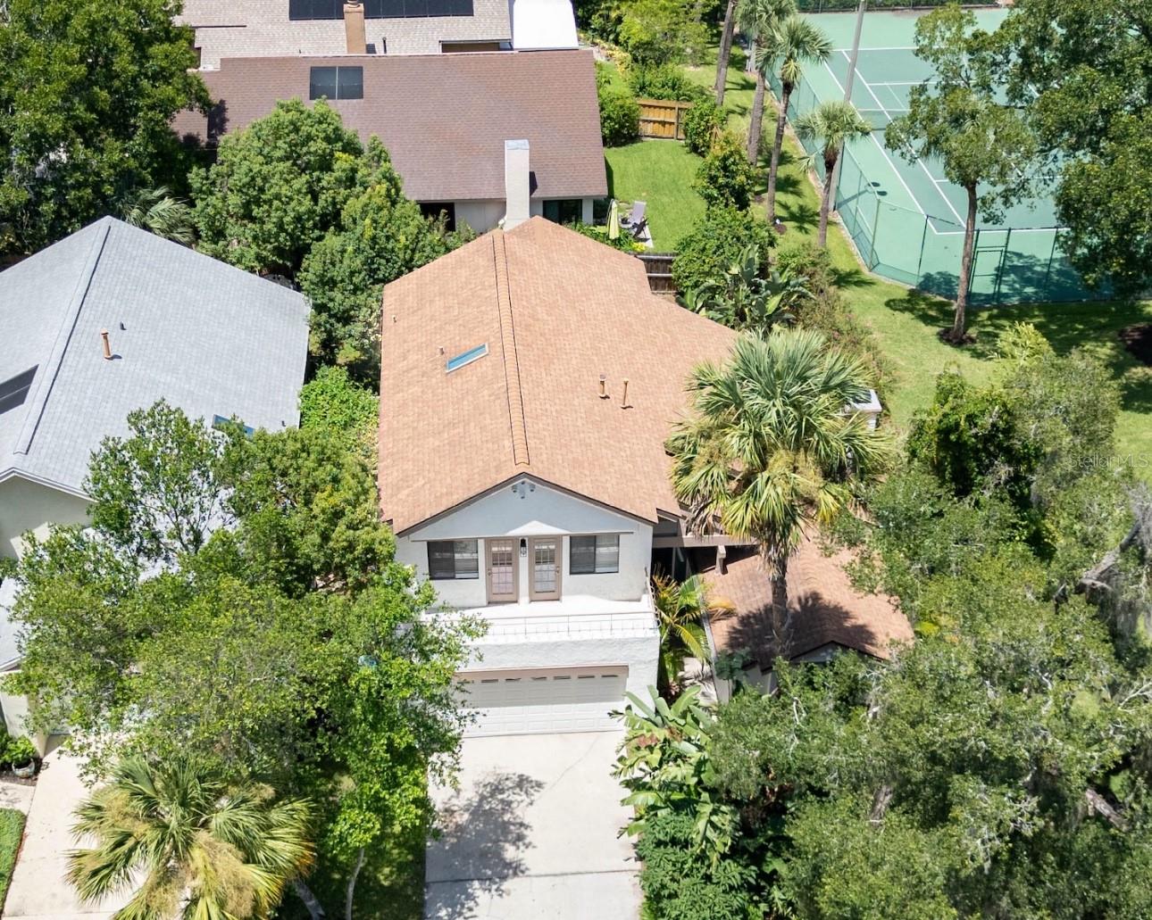Tucked away in one of Longwood’s most peaceful gated communities, this beautifully renovated home is full of character and offers the perfect balance of privacy and accessibility. Located in The Landings of Longwood, you’ll enjoy quiet, tree-lined streets just minutes from the charm of downtown. Spend weekends strolling through the Longwood Farmers Market, enjoying live music at Reiter Park, or dining at beloved local spots - all while soaking in the welcoming, close-knit community atmosphere Longwood is known for.
Inside, a spacious layout welcomes you with volume ceilings, floor-to-ceiling windows, and Mediterranean-style flooring that fills the home with natural light and warmth. A wood-burning fireplace adds both charm and comfort, creating a cozy focal point for gatherings. All bedrooms, including the primary suite, feature beautiful hardwood flooring. The generous kitchen boasts brand new stainless steel appliances and overlooks a serene backyard, offering the potential for an impressive indoor-outdoor living experience. The primary suite is large and inviting, complete with generous storage and an en suite bathroom. Two additional bedrooms open onto a shared balcony - perfect for enjoying your morning coffee or a sunset breeze.
This home also includes a bonus room—absolutely beautiful and spacious - with a separate entrance. It’s an ideal space for a home office, additional bedroom, studio, or guest suite.
Step outside to your private backyard oasis surrounded by lush, mature landscaping. There’s plenty of space to entertain guests, start a garden, or simply relax in the peaceful setting. There’s also additional guest parking right next to the home - a rare convenience in a gated community.
As a resident of The Landings, you’ll enjoy access to West Lake - a scenic 28-acre lake perfect for canoeing or trolling motors - along with walking paths, tennis and pickleball courts, and a community pool for year-round enjoyment.
Living here combines easy access to everything you need with a tranquil, private setting, including SunRail, major highways, Orlando Health South Seminole Hospital, top-rated Seminole County schools, parks, restaurants, medical offices, and everyday amenities.
This is a rare opportunity to own a home with true character in a sought-after neighborhood. Welcome to The Landings - your next chapter starts here.