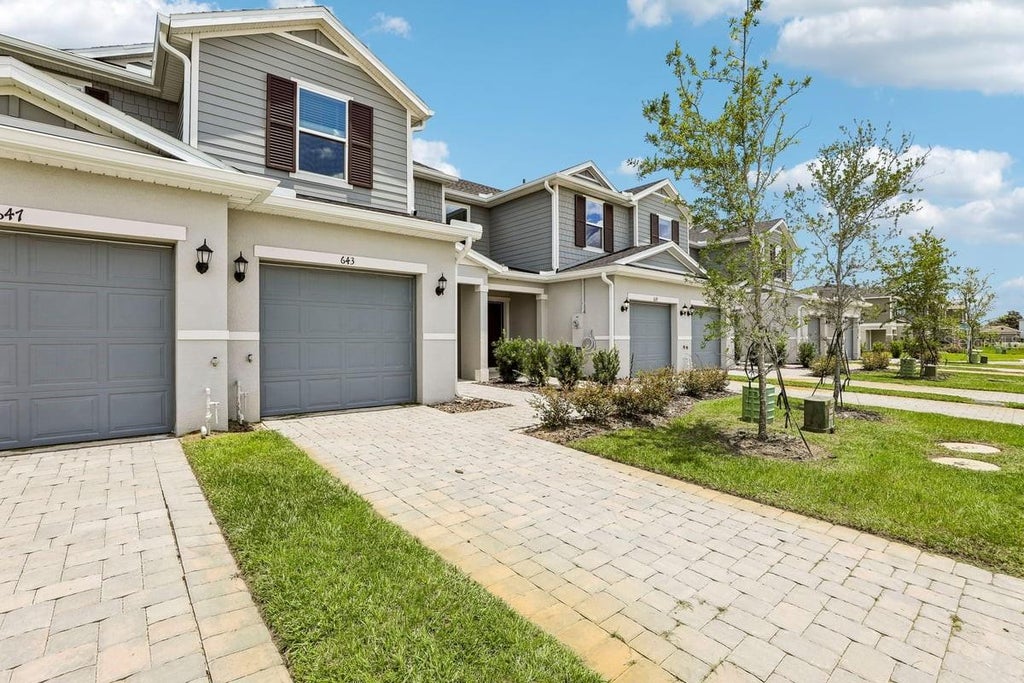 Photo of 643 Meadows Edge Place, Lake Wales, FL 33859 (MLS # O6443302)