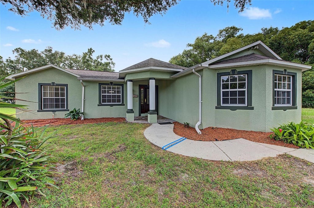 Photo of 10922 Tarpon Springs Road, Odessa, FL 33556 (MLS # TB8561613)