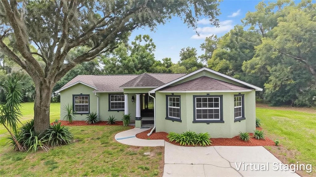 Photo of 10922 Tarpon Springs Road, Odessa, FL 33556 (MLS # TB8561613)