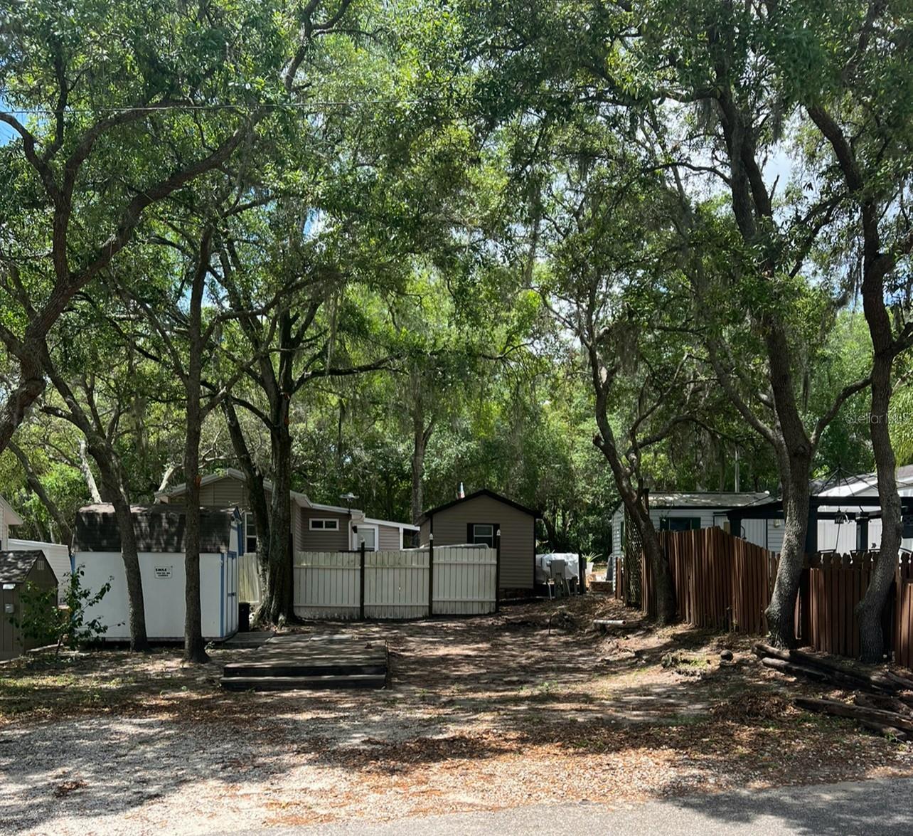 OWNER FINANCING!!! Great investment opportunity. Located in Clarcona Resort, great gated community in Apopka with great amenities like pool, groceries and supermarket inside. Call and schedule a visit. HOA fees include water, sewer, trash and leaf collection. Amenities are a swimming pool, wading pool, playground, basketball, mini golf, shuffleboard and horseshoes. Many activities in the park. This Gated Community is Close to Disney, Restaurants, Shopping, Highways and More