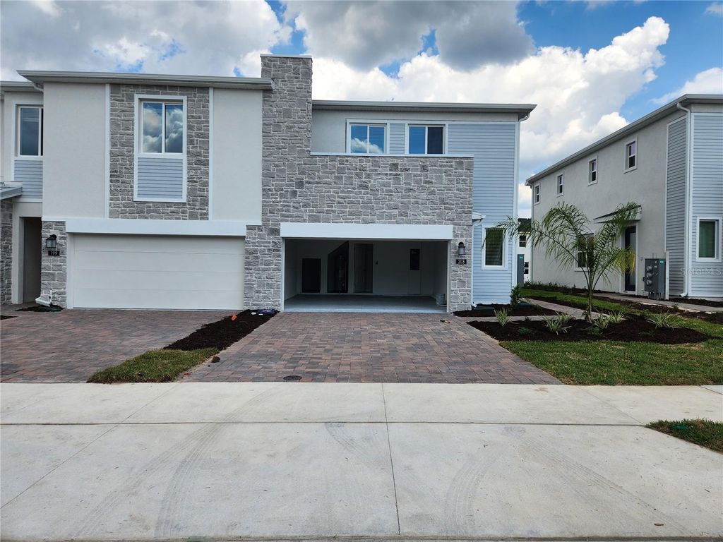 Photo of 203 Bogey Drive, Davenport, FL 33896 (MLS # S5147673)