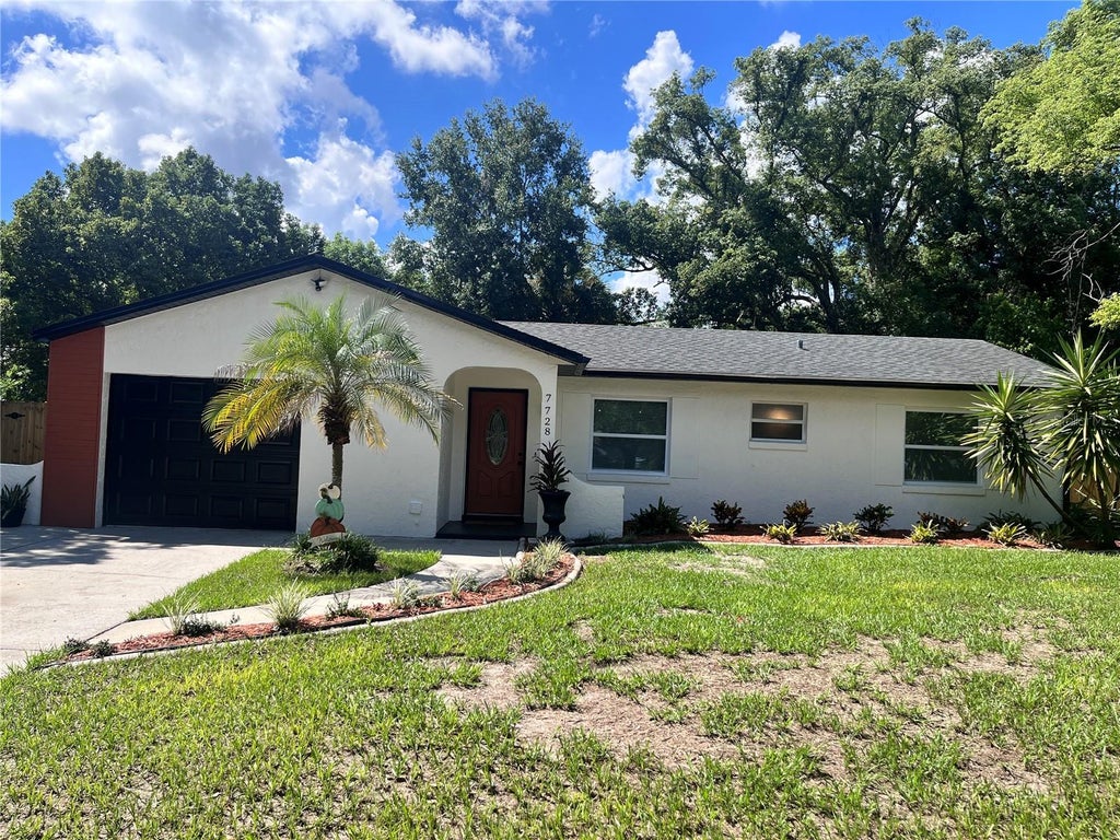 Photo of 7728 Whisper Place, Orlando, FL 32810 (MLS # O6441969)