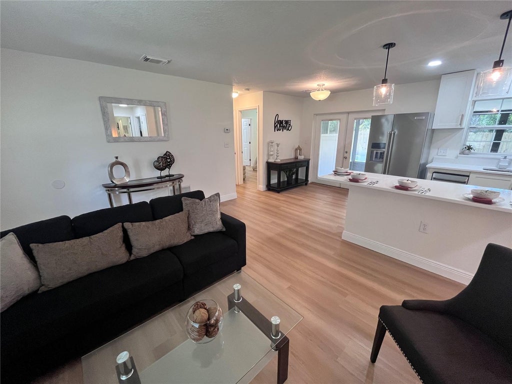 Photo of 7728 Whisper Place, Orlando, FL 32810 (MLS # O6441969)