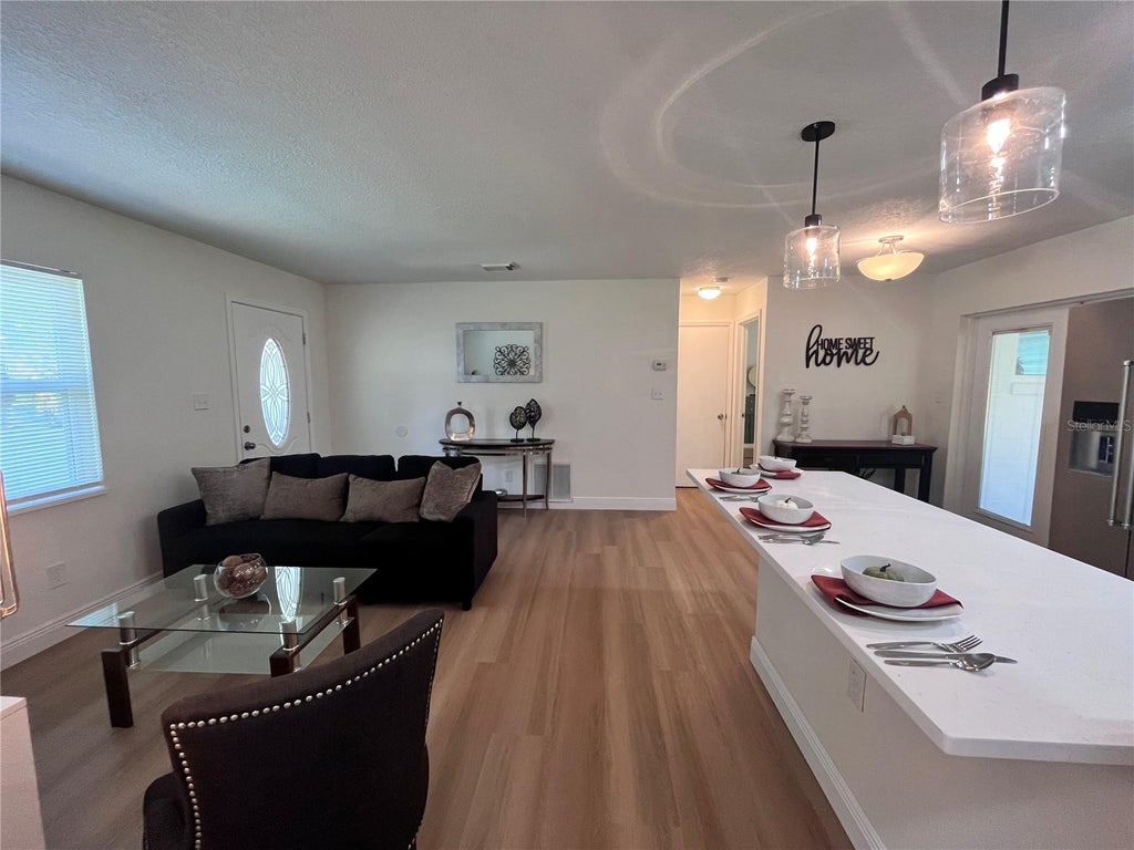 Photo of 7728 Whisper Place, Orlando, FL 32810 (MLS # O6441969)