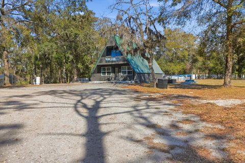 Photo of 12142 Boondocks Drive, Brooksville, FL 34614 (MLS # TB8474845)