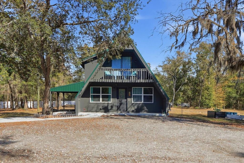 Photo of 12142 Boondocks Drive, Brooksville, FL 34614 (MLS # TB8474845)