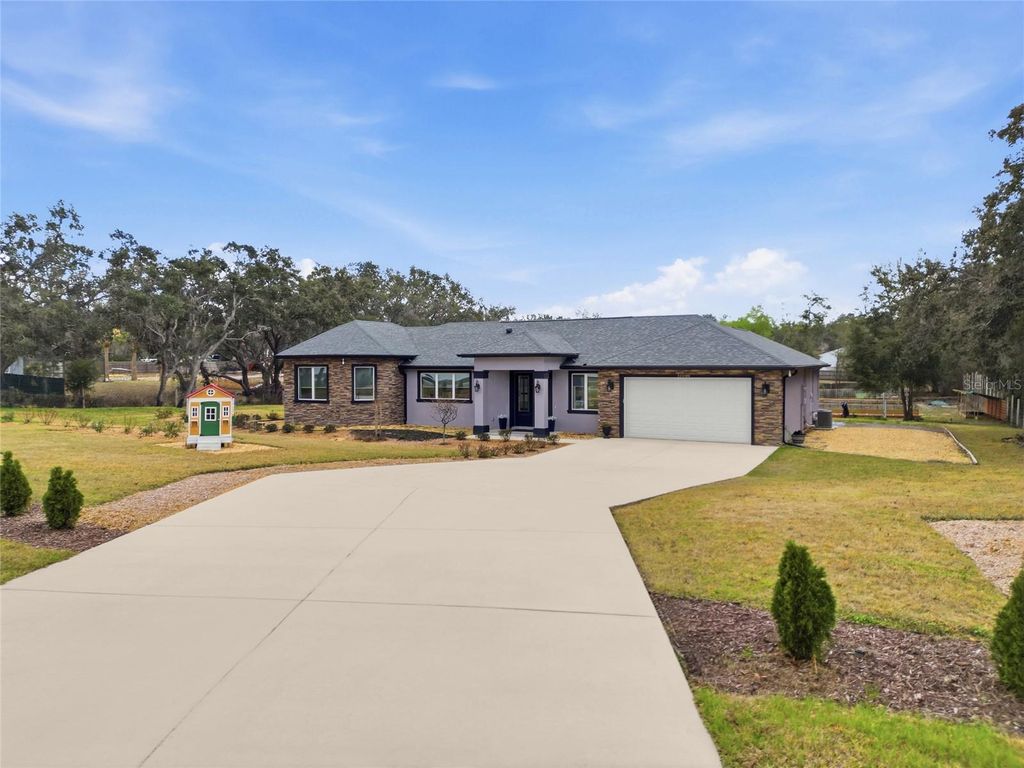 Photo of 16090 Fringe Tree Drive, Spring Hill, FL 34610 (MLS # TB8478134)