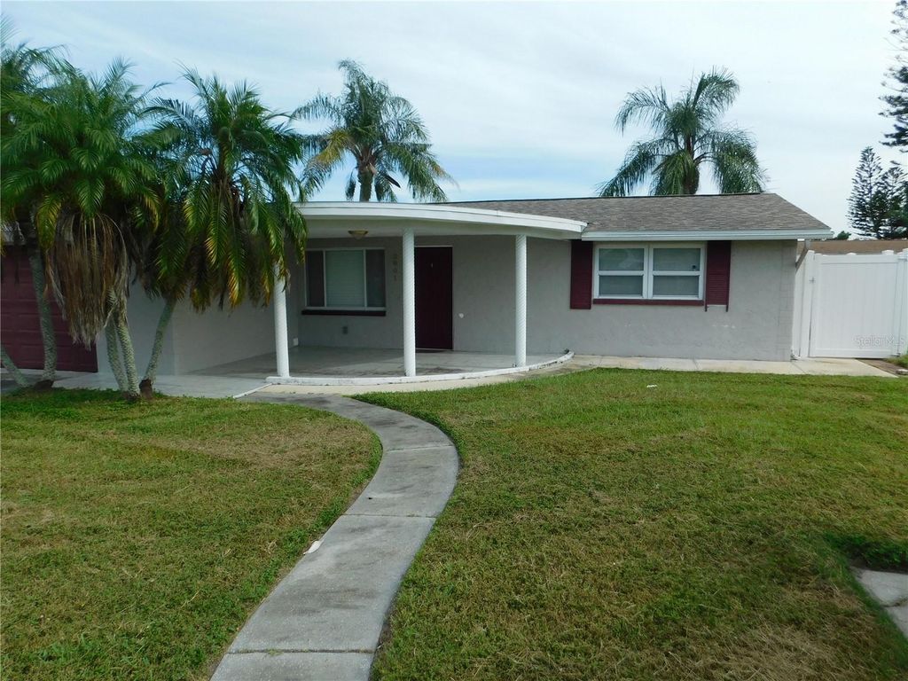 Photo of 3801 Darlington Road, Holiday, FL 34691 (MLS # O6388885)