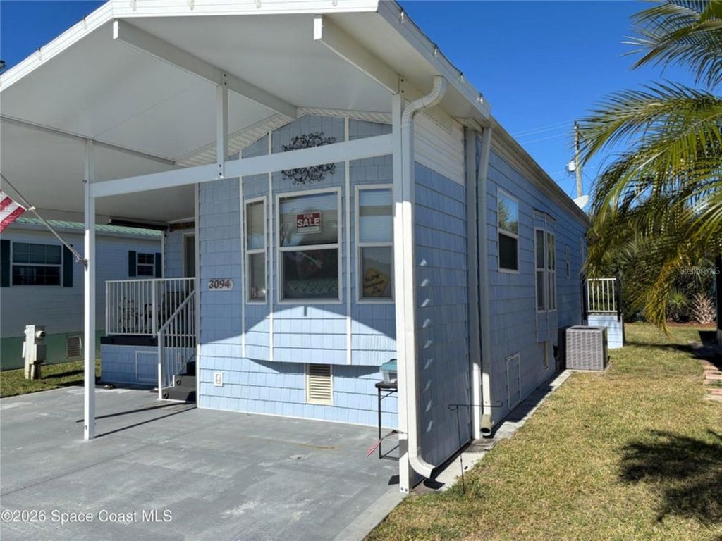 Photo of 3094 Centaur Lane #21, Titusville, FL 32796 (MLS # O6405299)