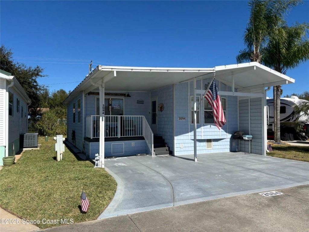 Photo of 3094 Centaur Lane #21, Titusville, FL 32796 (MLS # O6405299)