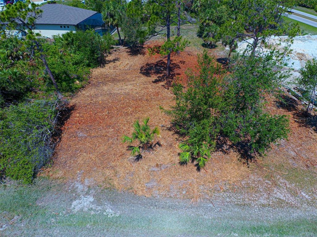 Photo of 116 Redwood Road, Rotonda West, FL 33947 (MLS # N6137827)