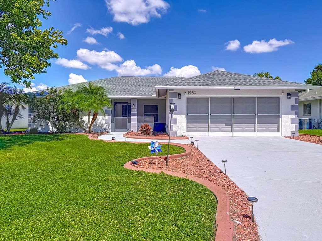 Photo of 1950 Tarpon Court, Wesley Chapel, FL 33543 (MLS # TB8432014)