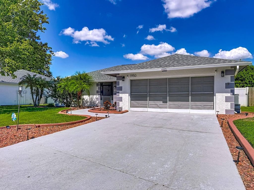 Photo of 1950 Tarpon Court, Wesley Chapel, FL 33543 (MLS # TB8432014)