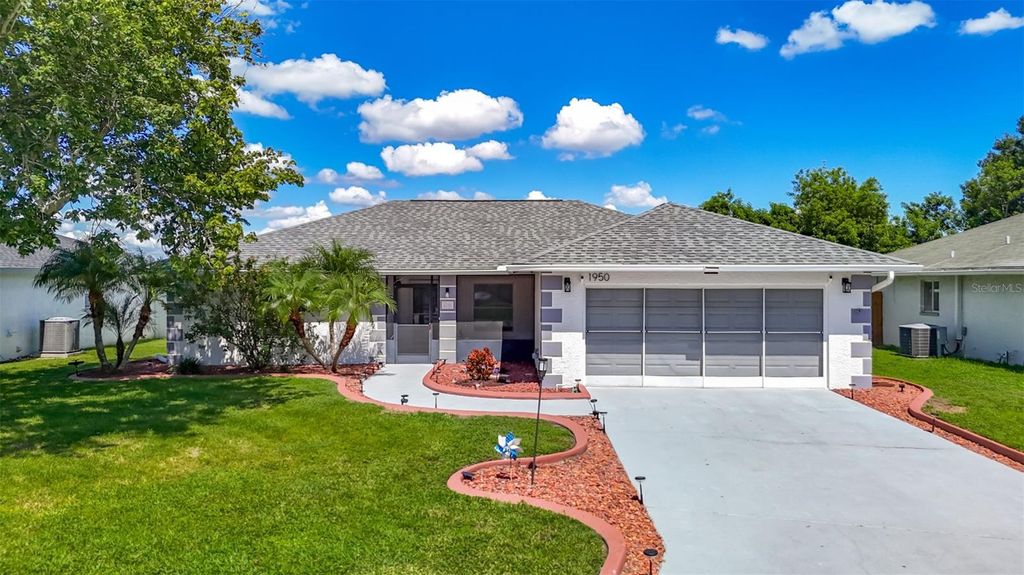 Photo of 1950 Tarpon Court, Wesley Chapel, FL 33543 (MLS # TB8432014)
