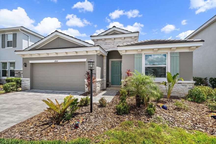 Why wait to build when you can move right into BETTER-THAN-NEW living in Star Farms at Lakewood Ranch? This meticulously maintained home, offers NEW CONSTRUCTION WITHOUT THE DELAY, plus OVER $20,000 IN THOUGHTFUL UPGRADES already completed for you. Spanning 2,045 sq. ft., this residence features 3 BEDROOMS, a PRIVATE OFFICE, 2.5 BATHROOMS, and a spacious 2-CAR GARAGE, designed with both functionality and modern living in mind. The seller spared no detail, showcasing CUSTOM BUILT-IN CABINETRY in the kitchen pantry and owner’s closet, delivering exceptional organization and storage. Enjoy ELEGANT LIGHTING throughout, creating a warm and refined atmosphere in every room. The garage has been fully enhanced with CONCRETE COATING FLOORING, CUSTOM BUILT-IN GARAGE CABINETS, and a BUTCHER BLOCK COUNTERTOP, perfect for storage, projects, or added utility. This home also features a WHOLE-HOUSE WATER SOFTENER SYSTEM along with a REVERSE OSMOSIS SYSTEM, providing high-quality water throughout the home. Step outside to your FULLY FENCED BACKYARD with a tranquil POND VIEW—ideal for relaxing or entertaining with added privacy. Conveniently located NEAR ONE OF THE COMMUNITY POOLS, you’ll enjoy easy access to the resort-style amenities Star Farms is known for. Star Farms at Lakewood Ranch offers a vibrant lifestyle with RESORT-STYLE POOLS, FITNESS CENTER, WALKING TRAILS, and a growing community atmosphere. With the addition of a NEW ELEMENTARY SCHOOL nearby, it continues to be a highly desirable location for full-time residents and families alike. This home combines MODERN DESIGN, PREMIUM UPGRADES, PRIME LOCATION, and immediate move-in convenience without the uncertainty of building. Schedule your showing today and experience the difference.