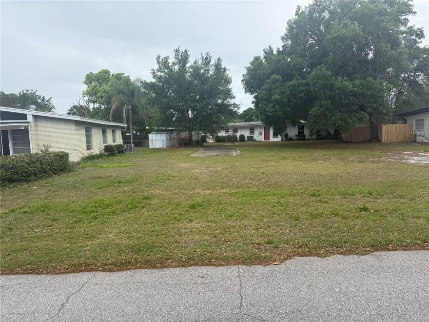 A rare opportunity to secure a shovel-ready residential lot in Orlando's established Lake Jessamine neighborhood. This 7,223 square foot parcel sits on a quiet street in the Jessamine Terrace subdivision, zoned R-1AA for single-family residential — ideal for a custom build or investment project.Benefiting from a clean slate with no structures on site, the lot offers a blank canvas for your vision. The property sits in FEMA Flood Zone X, meaning no flood insurance requirement, and carries low annual taxes. Utilities are accessible along both Moonlight Circle and Zimmerman Drive frontage per the existing survey. Centrally located with quick access to major corridors, downtown Orlando, and the Florida Turnpike. Oak Ridge High School is just 0.3 miles away. Whether you're a builder, developer, or buyer looking to design from the ground up — opportunities like this in-fill lots inside the 32839 zip code don't last.