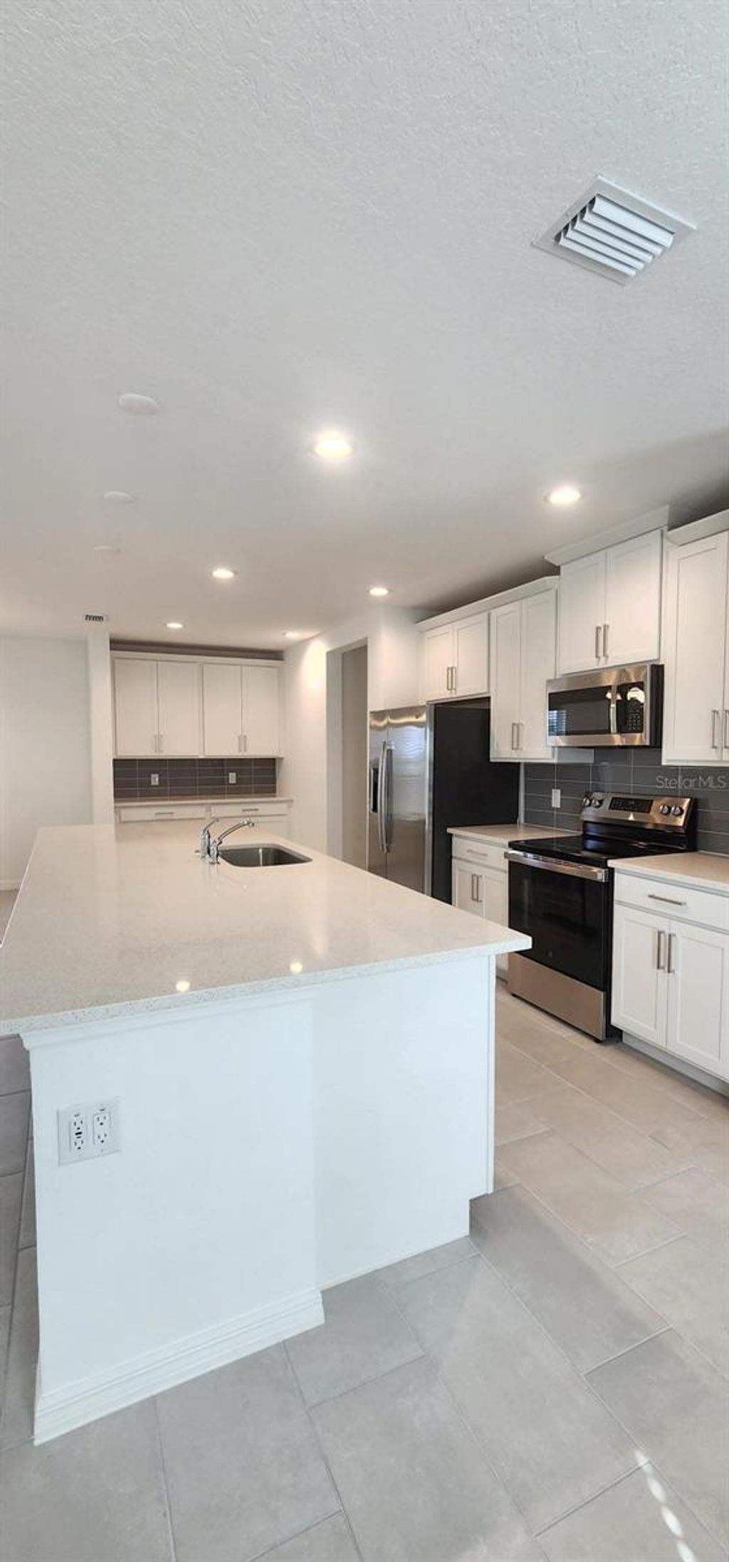 Photo of 1203 Island Slough Lane, Davenport, FL 33837 (MLS # O6398409)