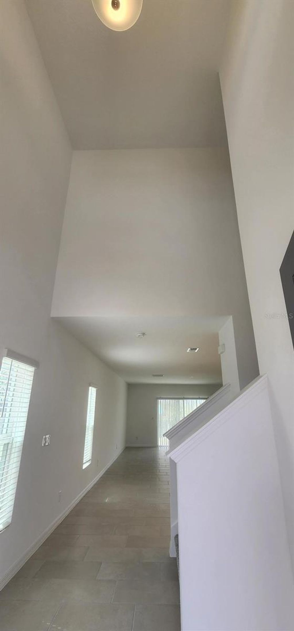 Photo of 1203 Island Slough Lane, Davenport, FL 33837 (MLS # O6398409)