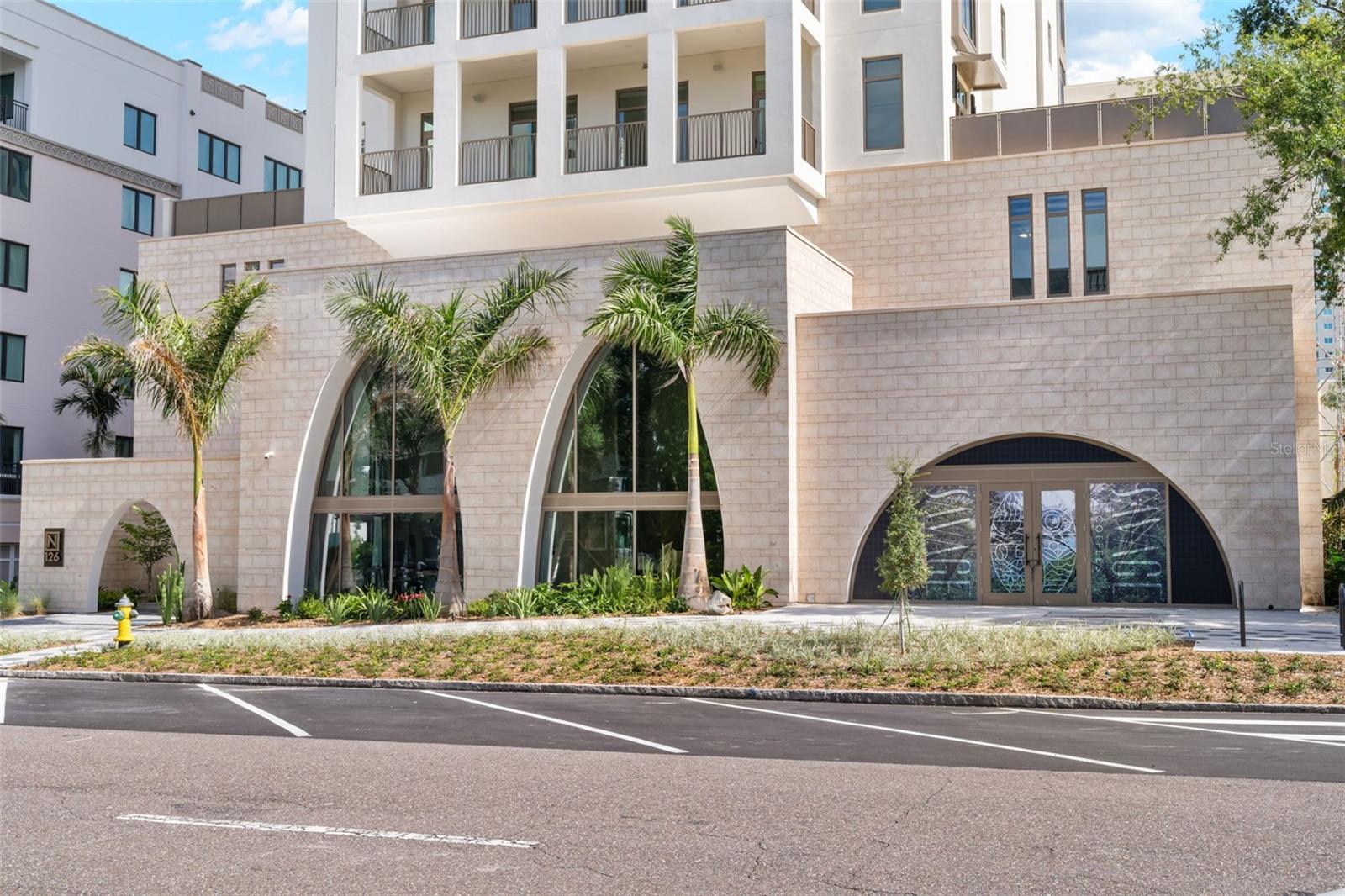 Under Construction. The Nolen St Pete is a 23 story boutique condominium with only 31 residences where the private elevator opens into your own dedicated foyer. ALL INCLUSIVE the Nolen was designed by an experienced local development team that will introduce St Petersburg to a new level of elegance in high-end luxury. As an NGBS designated GREEN BUILDING, the Nolen comes complete with a comprehensive building generator providing emergency power to all residences and also an integrated water softening system for the whole building. Each home is a corner residence that has NO SHARED WALLS for ultimate privacy with floor to ceiling impact-rated energy efficient windows. Residence A will feature 10’ ceilings which includes LED lighting throughout and pre-wire for blinds in the main living area. The interior features include: Cabinet panel Thermador appliances including an induction range and under counter wine fridge, a large kitchen island featuring quartz countertops and waterfall edges, an impact resistant granite farmhouse sink, and selections of large format porcelain tile or sophisticated engineered wood floors throughout. The owner’s bathroom features a freestanding soaking tub, large walk-in shower, Brizo plumbing fixtures, Toto toilets, and designer featured wall tile. ALL included in the price with NO extra charge! The large outdoor terrace stretches 38’ from the living room to the owner’s suite allowing sunrise and sunset views. This community also has a gorgeous fourth floor elevated amenities level with a club room, fitness center, saltwater pool, and spa, covered cabanas for shade, an outdoor barbecue area and fire pit conversation areas. Complete with a concierge service and a full-time property manager, you will enjoy the comforts and ease of a care-free lifestyle. THE NOLEN is the new place to be for immediate access to restaurants, museums, art, and retail and all the top attractions in St Pete. ALL residences include 2 assigned parking spaces that are pre-wired for electric car charging, and a climate controlled private storage room in front of one of the parking spaces. This is GOLD in downtown St Petersburg!