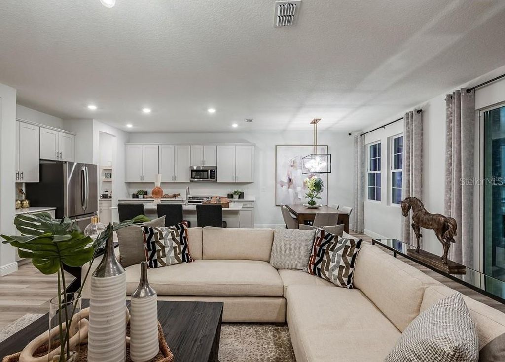 Photo of 10009 Surrey Rose Dr, San Antonio, FL 33576 (MLS # TB8504425)