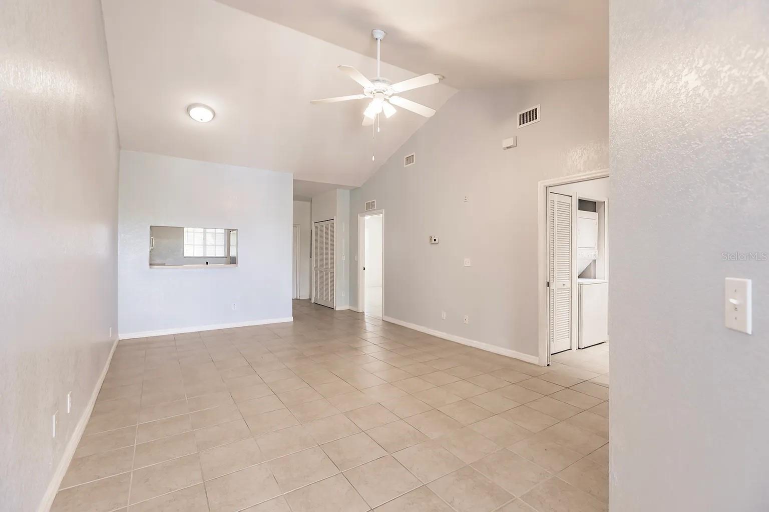 Step into this beautiful second-floor condo offering comfort, style, and functionality. Featuring a spacious layout with carpet and bright paint throughout, this home truly shines with pride of ownership. The master suite includes a huge walk-in closet and an en-suite bathroom with dual sinks, beautiful tile work, and a walk-in shower. The second and third bedrooms are generously sized and conveniently located near a second full bath.
The kitchen has bright cabinets. Newer appliances, including a washer/dryer combo, perfect for easy everyday living. Relax in your screened lanai with a private view, or take advantage of the extra storage unit included with the condo. Notable benefits include a new A/C system, hurricane impact windows, and a durable tile roof. This well-maintained community features a heated pool, clubhouse, and fitness center for your enjoyment. Conveniently located just minutes from beaches, shopping, the airport, and I-75, and a short walk to Six Mile Cypress Slough Preserve, offering miles of nature trails and boardwalks — this condo is a must-see! Minimum credit score of 650.