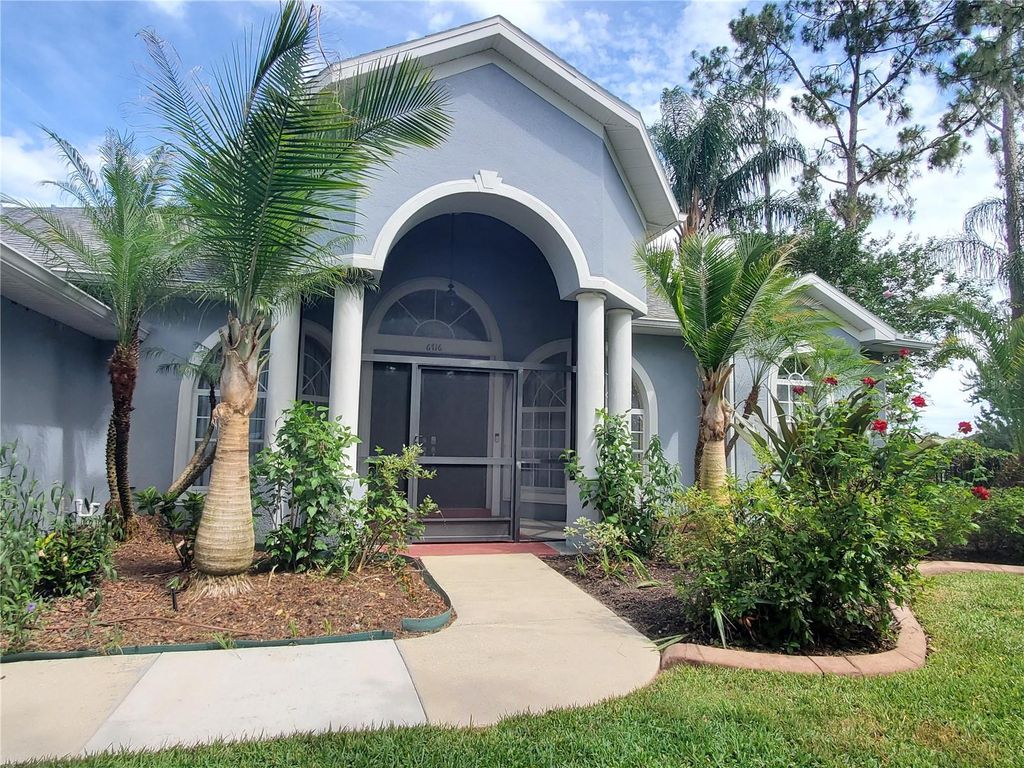Photo of 6716 Magnolia Point Drive, Land O Lakes, FL 34637 (MLS # TB8483564)