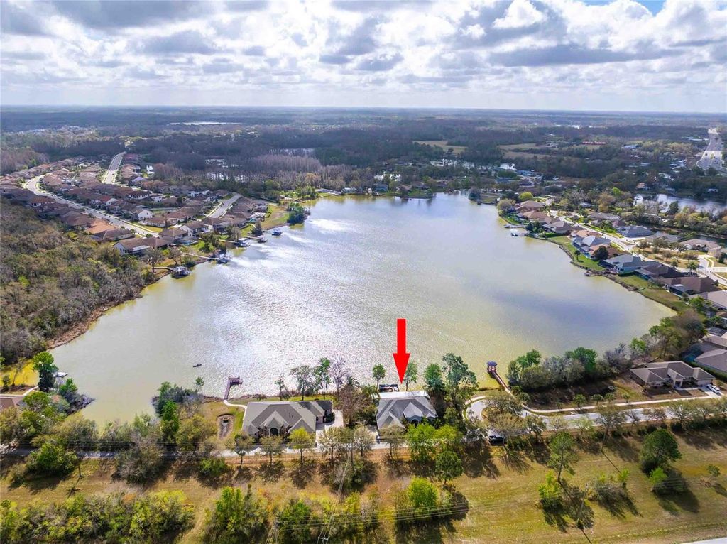 Photo of 6716 NW Magnolia Point Drive, Land O Lakes, FL 34637 (MLS # TB8483564)