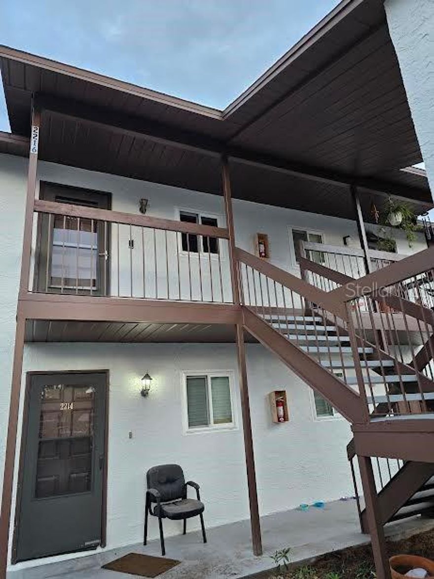 Are you looking for maintenance free living? Come check out this 2 bed, 2 bath second floor condo located in Talia Condominiums complex. The open floor condo is move in ready. Kitchen has lots of counter and cupboard space with a breakfast bar. Livingroom floors are easy care laminate. It is a split bedroom floor plan, guest or second bedroom is on front of home and the master is at the back. Both bedrooms have new carpet. There is a screened patio at the back of the home. Great place for your morning coffee or for the evening sunset. Laundry facilities are located within the unit. The community has a clubhouse, pool, volleyball courts, playground. and car wash area. Your fees covers the roof, windows, building exterior, ground maintenance, trash removal, use of screened in pool and common areas. Community is located minutes to down Zephyrhills, and is a short drive to Dade City, and Wesley Chaple, and Lakeland, Tampa and Orlando for shopping, entertaining, dining and Medical facilities. So if this sounds like where you would like to be, call for an appointment, Is priced to move and motivated seller.