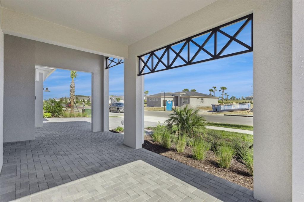 Photo of 1609 Bellagio Loop, Tavares, FL 32778 (MLS # O6378652)