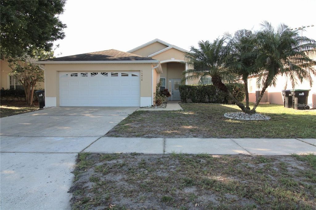 Photo of 11414 Pinewood Cove Lane, Orlando, FL 32817 (MLS # O6377020)