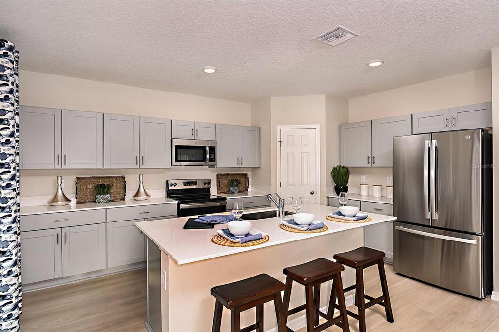 Photo of 1711 Vanilla Street, Haines City, FL 33844 (MLS # TB8490560)