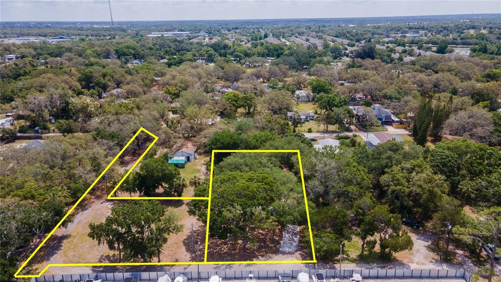 Photo of 1810 Cemetery Road, Holiday, FL 34691 (MLS # TB8502041)