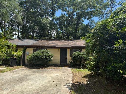 2/2 tiled flooring throughout (NO CARPET!!). Working kitchen with a large living room/dining room combo. Laundry closet is conveniently located near bedrooms. Sliders in living room leads to a covered lanai in the back with a storage closet. Fenced in yard.