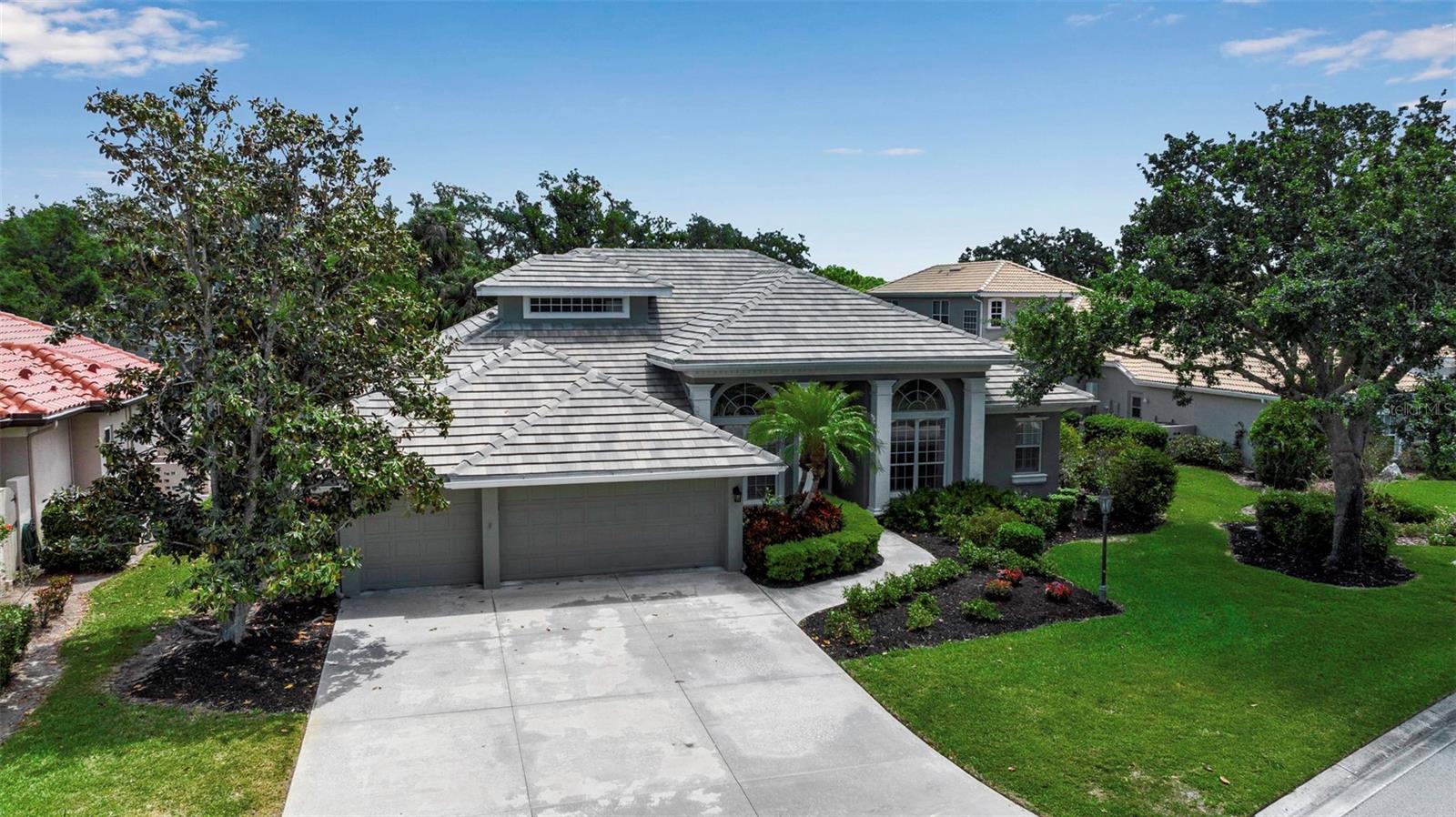 This spacious John Cannon pool home, offering almost 3,700 square feet of living space, features 5 bedrooms and 4 bathrooms, an office, living room, dining room, family room, laundry, and a 3-car garage. The sellers have enhanced the property by extending the lanai, adding paver bricks, resurfacing the pool with Pebble Tec, and adding a new pool cage and gutters. The tile roof was recently replaced, and a new dedicated AC system has been installed on the second floor. The kitchen boasts recently refinished cabinets, stainless steel appliances, a large pantry, and a natural gas stove. Granite countertops offer plenty of space for seating and serving. The master bedroom with two walk-in closets, overlooks the pool and preserve and features an en suite bathroom with a soaking tub, a walk-in shower, built-in vanity and dual sinks with abundant counter and storage space. On the other side of the home are 3 bedrooms, a shared bathroom for two of the bedrooms, and a third bathroom that also serves as the pool bath. Upstairs is an additional bedroom with an en-suite bathroom. This room could also be used as a game room, workout room, or second office. The property provides a great sense of privacy, as it is practically surrounded by the preserve, with no homes in front or behind. You can enjoy the serenity of your backyard with only the birds and deer, for company. The Hammocks is known for its low HOA fees and no CDD fees. Ideally located near top A-rated schools, the Pine View School bus picks students up near the front entrance of this gated community. Dining and shopping options are nearby (a Publix Plaza is less than ¾ mile), plus recreational venues including 5 golf courses: Laurel Oaks (which also has tennis and pickleball), Misty Creek, Bent Tree, Founders Club, Gator Creek plus NXGEN indoor Golf Studio. Rothenbach Park with bike and nature trails is across the street from The Hammocks and a short drive will take you to Siesta Key Beach, downtown Sarasota, Waterside Place in Lakewood Ranch and the UTC Mall. This location offers the perfect blend of lifestyles, enjoy the quiet tranquility of your home, and
advantage of the vibrancy all the surrounding area has to offer!
