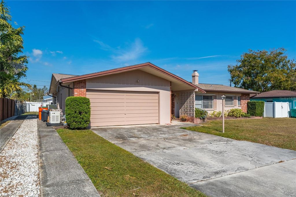 Photo of 1664 Whitewood Drive, Clearwater, FL 33756 (MLS # TB8450536)